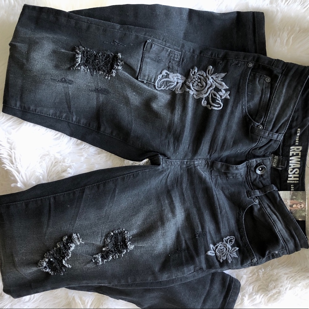 Embroidered and distressed black jeans